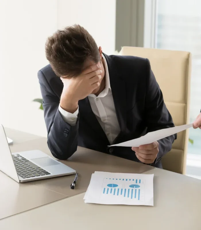 man faces business challenges